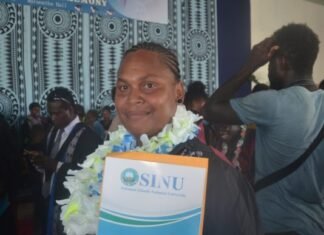 Mother Receives Double Diplomas